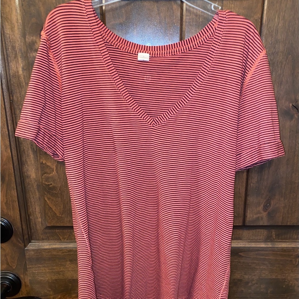 Pink and Black lulu lemon v neck shirt.